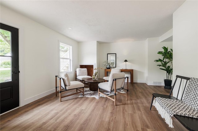 3908 Stalker Rd, Walworth, NY 14502 - sitting room with wood finished floors and baseboards