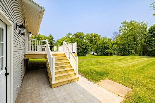 3908 Stalker Rd, Walworth, NY 14502 - view of grassy yard with stairway and a deck