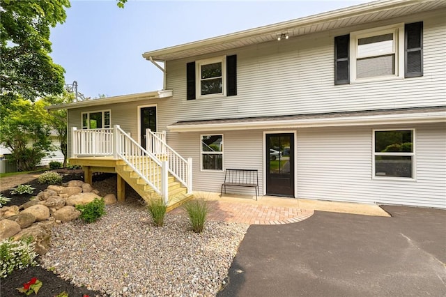 3908 Stalker Rd, Walworth, NY 14502 - view of front of house featuring a patio area and stairs