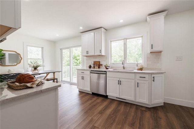 3908 Stalker Rd, Walworth, NY 14502 - kitchen with stainless steel dishwasher, a sink, dark wood finished floors, backsplash, and recessed lighting