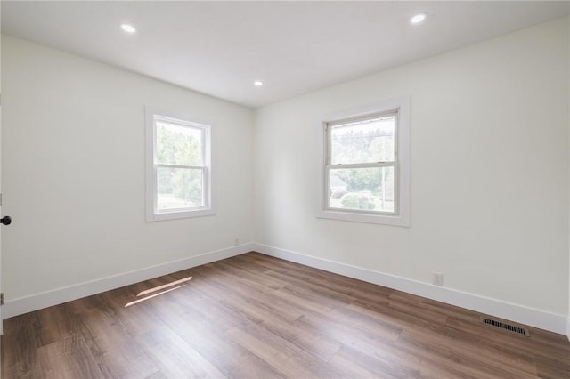 3908 Stalker Rd, Walworth, NY 14502 - empty room with wood finished floors, baseboards, and recessed lighting