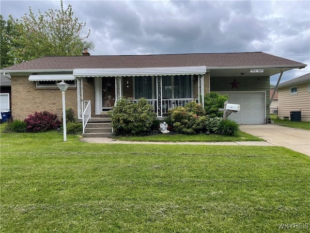48 Ward Ct, Buffalo, NY 14220 - ranch-style home with brick siding, a front lawn, driveway, covered porch, and roof with shingles