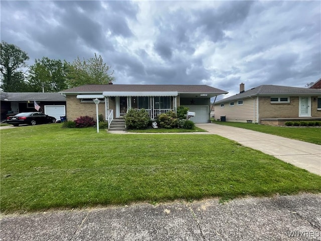 48 Ward Ct, Buffalo, NY 14220 - ranch-style house featuring a front yard, driveway, brick siding, a garage, and a carport