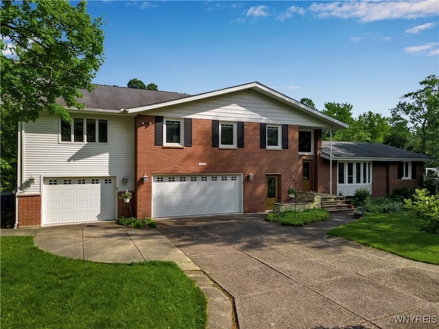 9325 Hunting Valley Rd N, Clarence, NY 14031 - view of front facade with an attached garage, brick siding, concrete driveway, and a front lawn