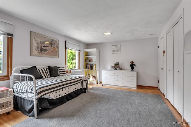9325 Hunting Valley Rd N, Clarence, NY 14031 - bedroom with wood finished floors and a closet