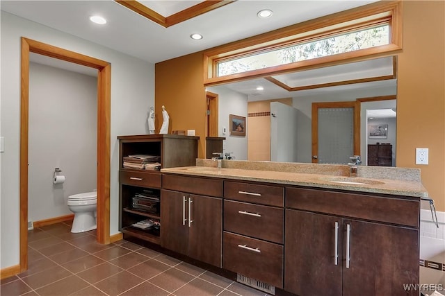9325 Hunting Valley Rd N, Clarence, NY 14031 - full bath featuring double vanity, recessed lighting, and tile patterned flooring