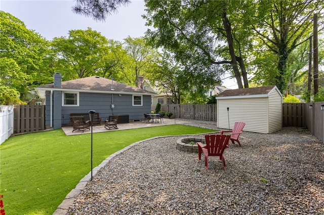 908 Winona Blvd, Irondequoit, NY 14617 - rear view of property featuring a patio, an outdoor fire pit, a chimney, and a shingled roof