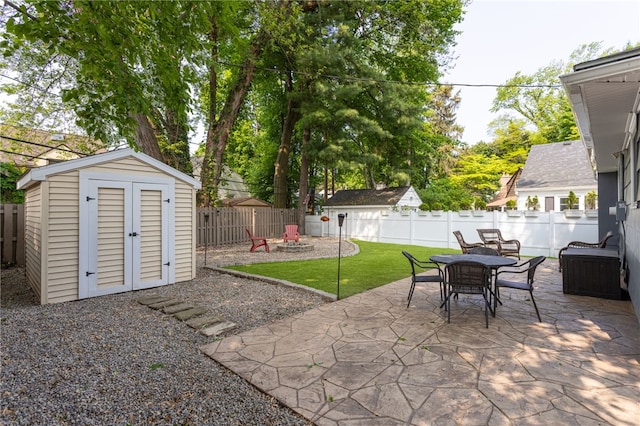 908 Winona Blvd, Irondequoit, NY 14617 - view of patio / terrace with an outdoor fire pit and outdoor dining area