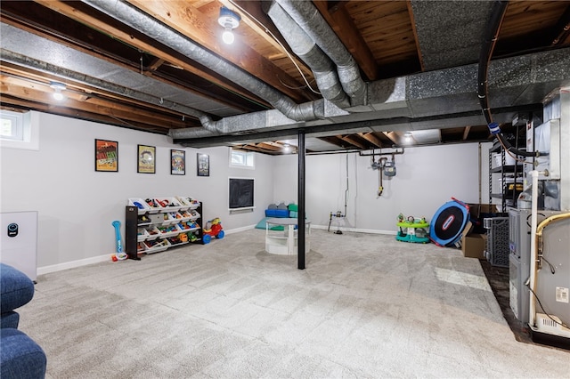 908 Winona Blvd, Irondequoit, NY 14617 - below grade area featuring baseboards, carpet, and gas meter
