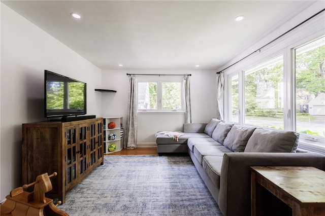 908 Winona Blvd, Irondequoit, NY 14617 - living room with wood finished floors, recessed lighting, and baseboards