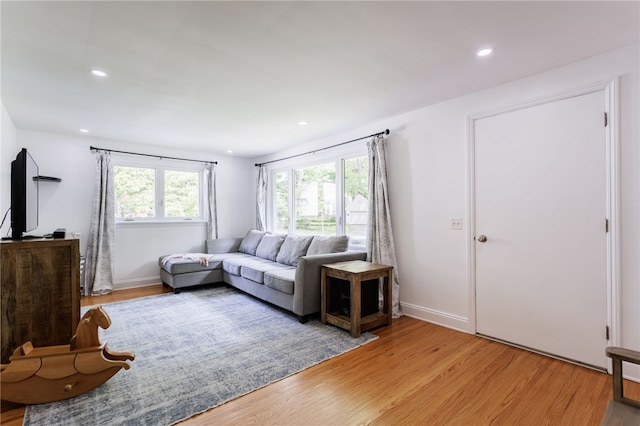 908 Winona Blvd, Irondequoit, NY 14617 - living room featuring light wood-style floors, recessed lighting, and baseboards