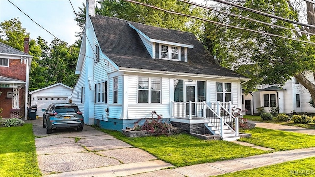 2019 Center St, North Collins, NY 14111 - view of front of property featuring an outbuilding, a detached garage, and a front lawn
