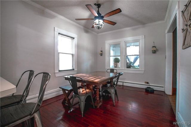 2019 Center St, North Collins, NY 14111 - dining area featuring a baseboard heating unit, hardwood / wood-style flooring, ceiling fan, ornamental molding, and baseboards