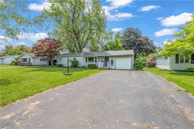 50 Loderdale Rd, Gates, NY 14624 - ranch-style house featuring a garage, driveway, and a front lawn