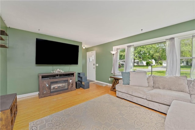 50 Loderdale Rd, Gates, NY 14624 - living room featuring wood finished floors and baseboards
