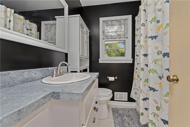 50 Loderdale Rd, Gates, NY 14624 - full bathroom featuring tile patterned floors, toilet, vanity, and a shower with curtain