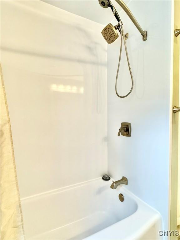 10 Litwak St, Fulton, NY 13069 - bathroom featuring shower / bath combo