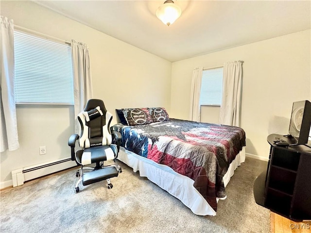 10 Litwak St, Fulton, NY 13069 - carpeted bedroom featuring a baseboard radiator and baseboards