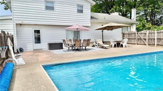 10 Litwak St, Fulton, NY 13069 - view of swimming pool featuring a patio and outdoor dining area