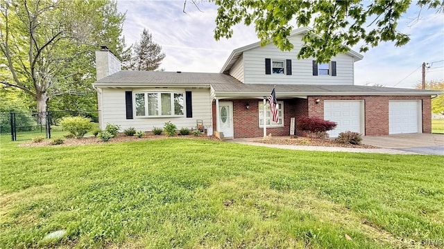10 Litwak St, Fulton, NY 13069 - view of front facade with driveway, a chimney, an attached garage, and brick siding