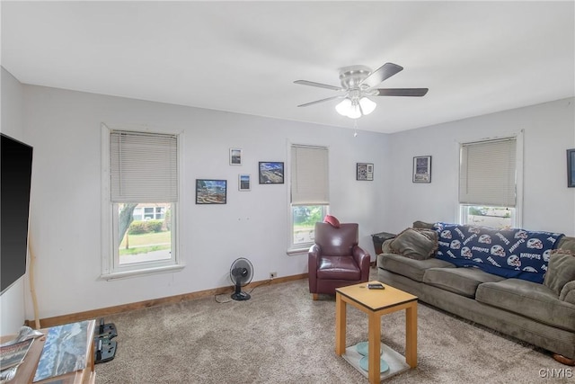 7-9 Tappan St Unit 7, Van Buren, NY 13027 - carpeted living area featuring healthy amount of natural light, baseboards, and a ceiling fan