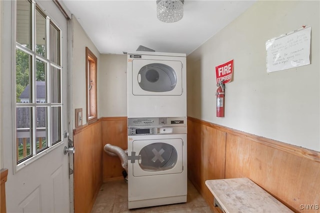 7-9 Tappan St Unit 7, Van Buren, NY 13027 - laundry room featuring estacked washer and dryer, wainscoting, and wood walls