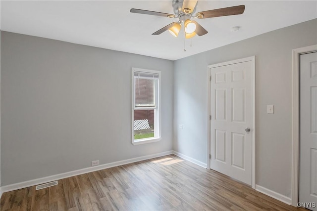 7-9 Tappan St Unit 7, Van Buren, NY 13027 - unfurnished bedroom featuring wood finished floors, baseboards, and a ceiling fan