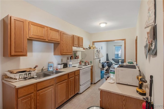 7-9 Tappan St Unit 7, Van Buren, NY 13027 - kitchen featuring white appliances, a sink, under cabinet range hood, and light countertops