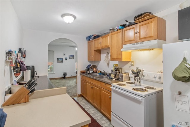 7-9 Tappan St Unit 7, Van Buren, NY 13027 - kitchen with under cabinet range hood, white appliances, arched walkways, and a sink