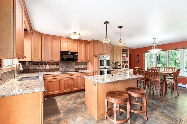 2260 Lamson Rd, Lysander, NY 13135 - kitchen featuring a sink, black appliances, tasteful backsplash, and light stone counters