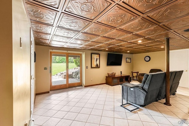 2260 Lamson Rd, Lysander, NY 13135 - living room featuring baseboards, light tile patterned flooring, and an ornate ceiling