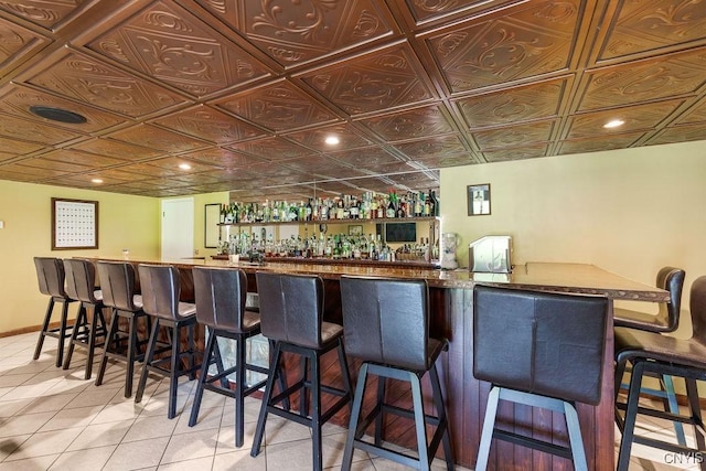 2260 Lamson Rd, Lysander, NY 13135 - indoor wet bar with light tile patterned flooring, recessed lighting, and an ornate ceiling