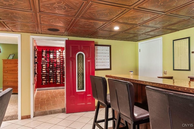 2260 Lamson Rd, Lysander, NY 13135 - indoor dry bar featuring light tile patterned floors and baseboards