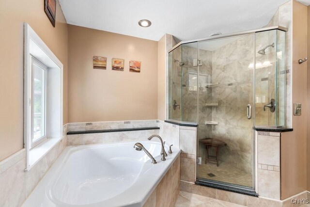 2260 Lamson Rd, Lysander, NY 13135 - bathroom with a bath and a stall shower