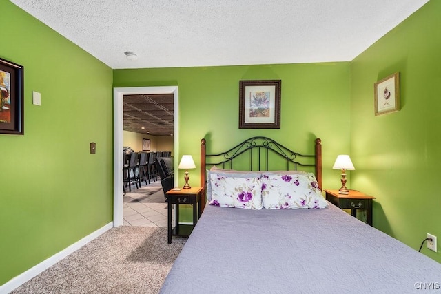 2260 Lamson Rd, Lysander, NY 13135 - bedroom featuring carpet flooring, baseboards, and tile patterned flooring