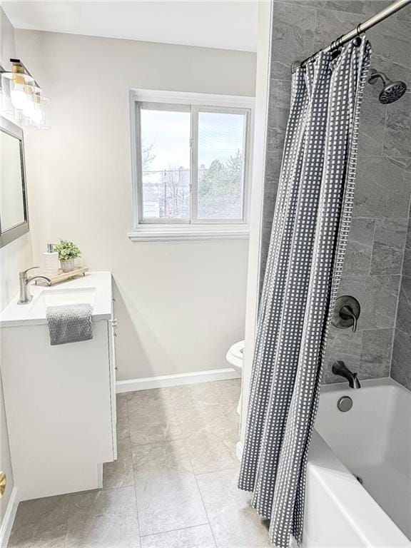 90 Fox Run, Gates, NY 14606 - full bathroom with vanity, shower / tub combo with curtain, toilet, tile patterned flooring, and baseboards