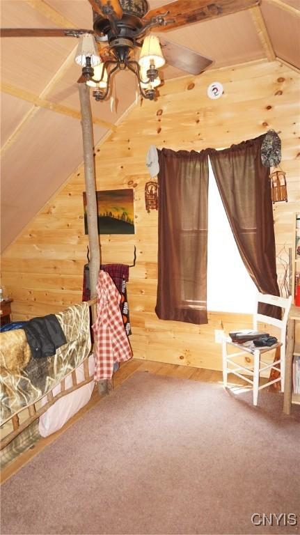 1507 Keeney Ln, Osceola, NY 13437 - unfurnished room featuring wood walls, a ceiling fan, lofted ceiling, and wood ceiling