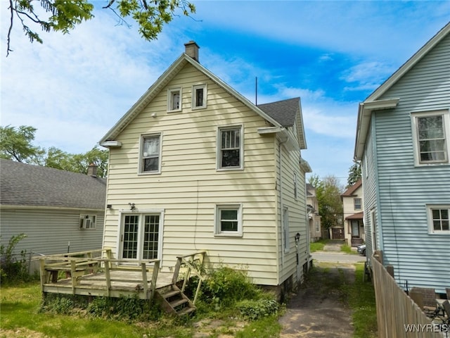2215 S Ave, Niagara Falls, NY 14305 - back of house featuring a chimney and a wooden deck