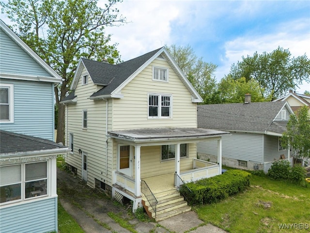 2215 S Ave, Niagara Falls, NY 14305 - traditional home with a porch and roof with shingles