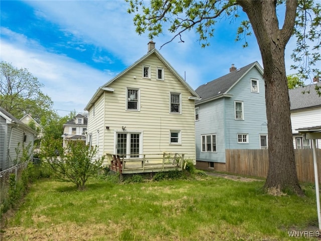 2215 S Ave, Niagara Falls, NY 14305 - back of house featuring a deck and a chimney
