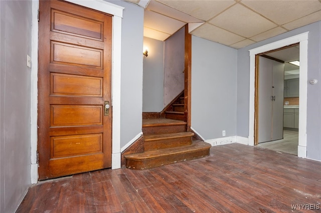 2215 S Ave, Niagara Falls, NY 14305 - staircase featuring hardwood / wood-style flooring, baseboards, and a paneled ceiling