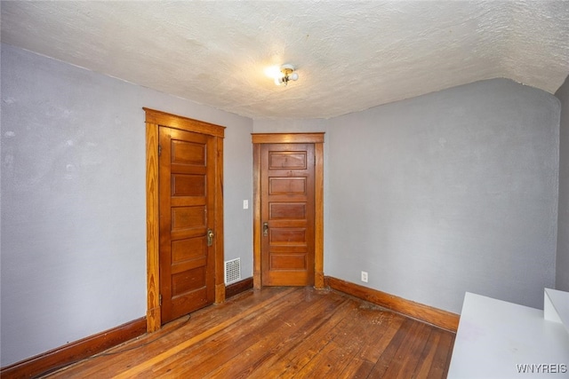 2215 S Ave, Niagara Falls, NY 14305 - spare room featuring hardwood / wood-style floors, baseboards, and a textured ceiling