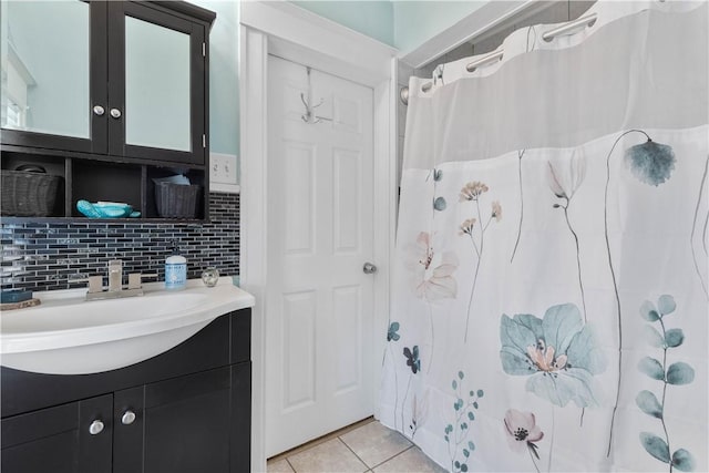 24 Spencer Rd, Irondequoit, NY 14609 - full bathroom with vanity, tile patterned flooring, decorative backsplash, and a shower with shower curtain