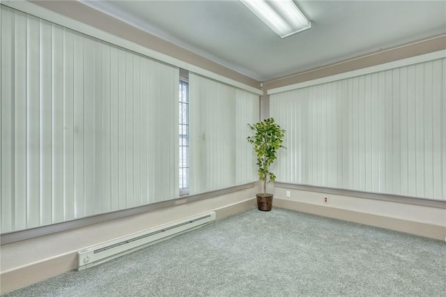 1845 N Clinton Ave, Rochester, NY 14621 - spare room with a baseboard heating unit and carpet