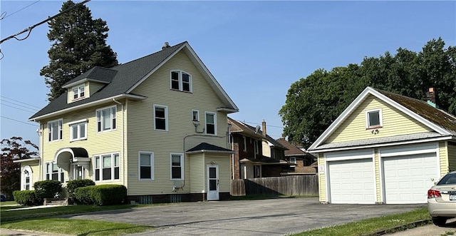 1845 N Clinton Ave, Rochester, NY 14621 - view of front of property featuring an outbuilding and a garage