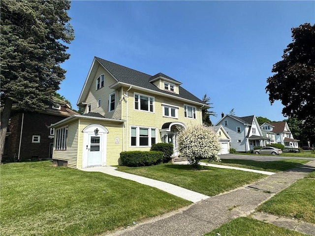 1845 N Clinton Ave, Rochester, NY 14621 - american foursquare style home featuring a front lawn and a garage