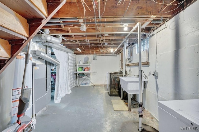 100 Brompton Rd, Amherst, NY 14221 - unfinished below grade area featuring separate washer and dryer