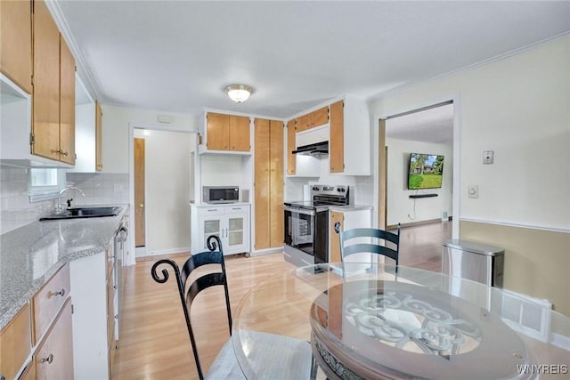 100 Brompton Rd, Amherst, NY 14221 - dining space with crown molding and light wood-style flooring