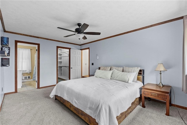 7425 State Route 20a, Bristol, NY 14469 - bedroom with baseboards, light colored carpet, ceiling fan, ensuite bathroom, and crown molding