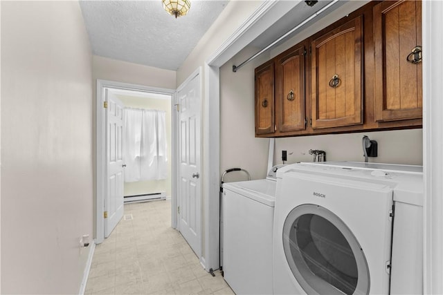 7425 State Route 20a, Bristol, NY 14469 - laundry room with cabinet space, a baseboard heating unit, washing machine and dryer, a textured ceiling, and baseboards